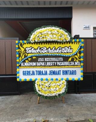 Papan Bunga Duka di Mentaos